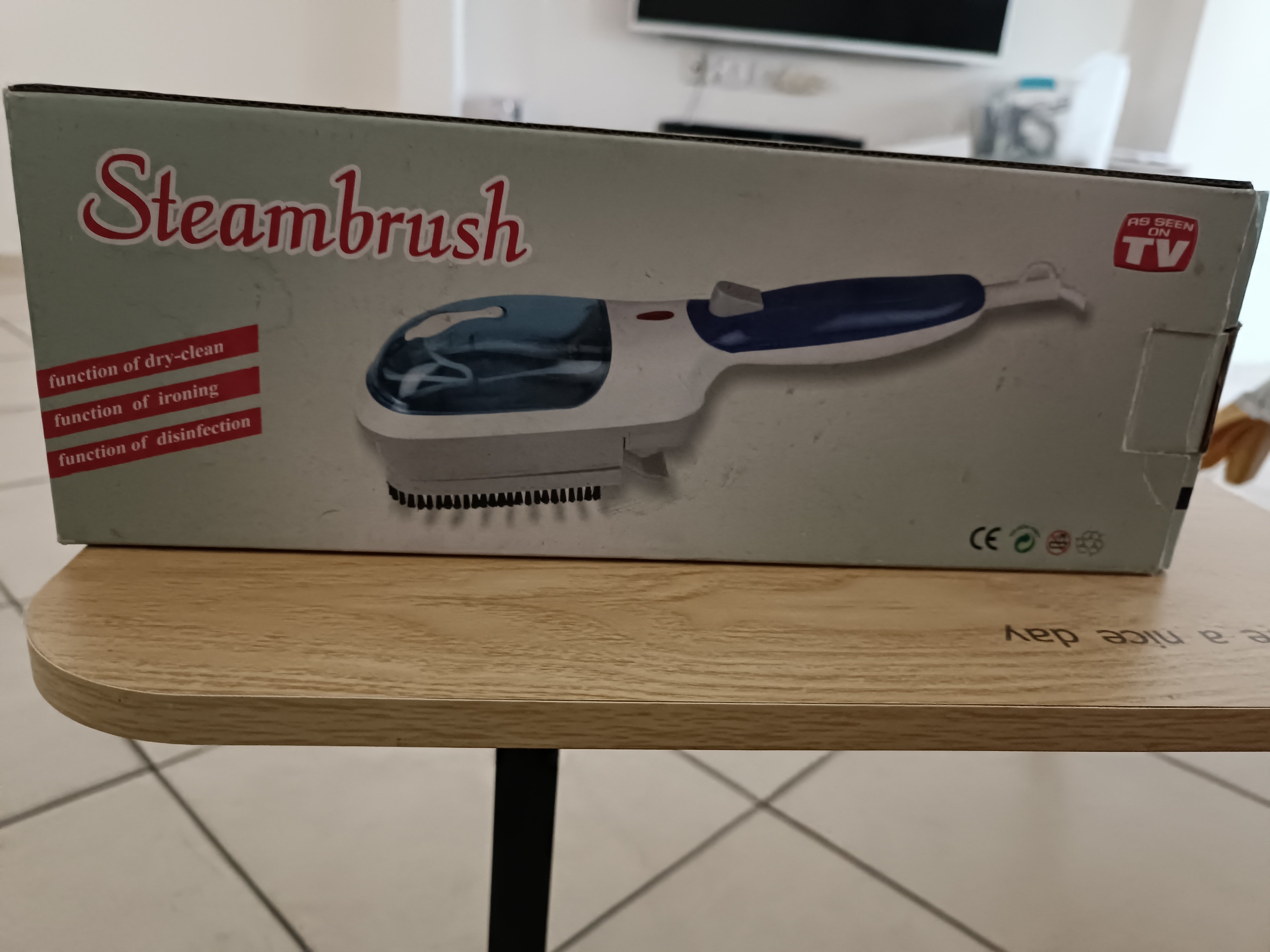 Steam brush for cleaning and ironing